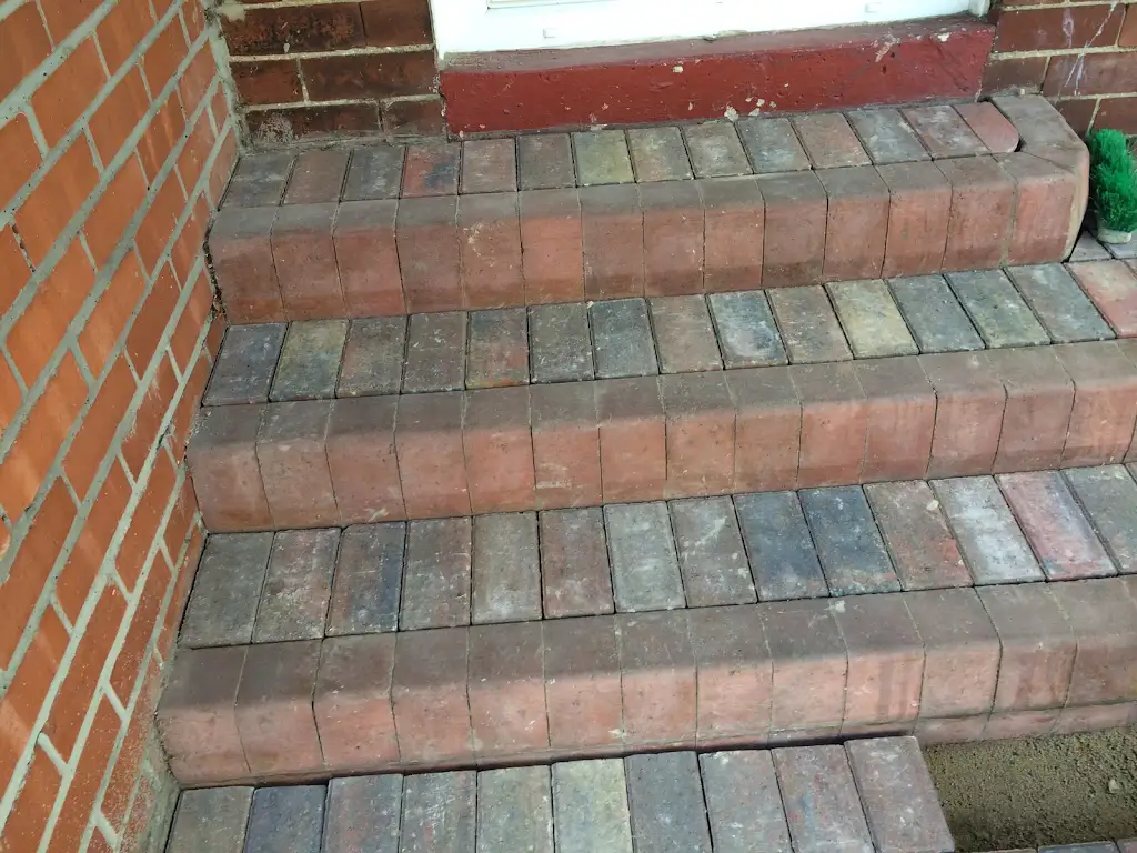 Brick steps and paving at a residential entrance